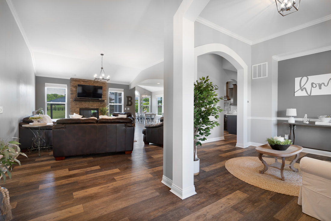 Bright interior home photo showing natural light and hardwood flooring